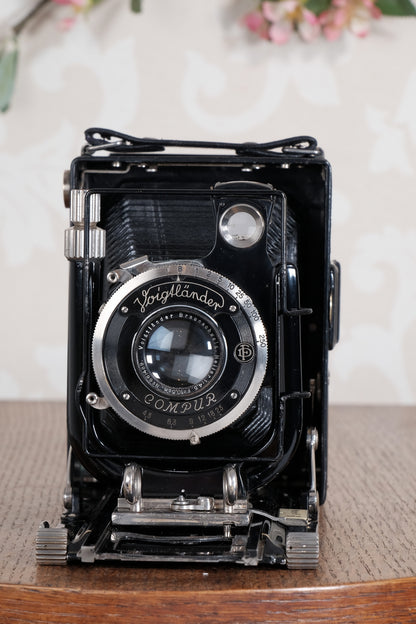 Excellent 1932 Voigtlander Bergheil with "rim-set" Compur shutter & Heliar lens. With 120 roll-film back, plate holders and case. Freshly serviced CLA’d