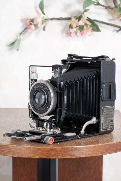 Excellent 1932 Voigtlander Bergheil with "rim-set" Compur shutter & Heliar lens. With 120 roll-film back, plate holders and case. Freshly serviced CLA’d