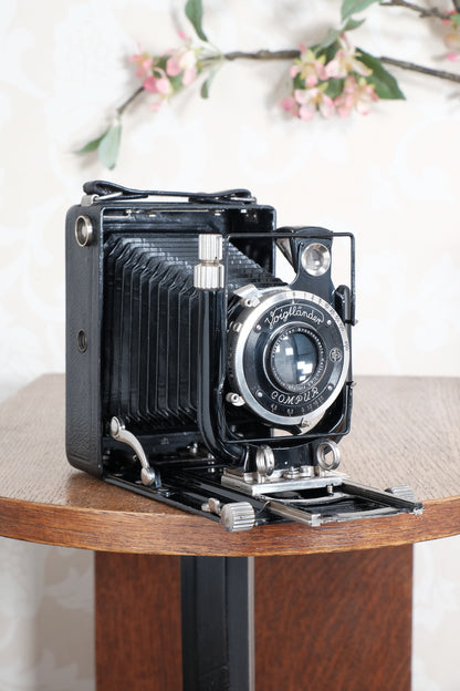 Excellent 1932 Voigtlander Bergheil with "rim-set" Compur shutter & Heliar lens. With 120 roll-film back, plate holders and case. Freshly serviced CLA’d