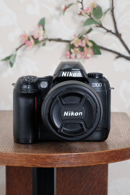 Superb! Nikon D100 with lens, battery grip & accessories